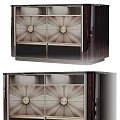 Elegant Modern Cabinet With Radiant Pattern Drawers Sleek Metal Trim And Glossy Surface