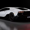 White Lamborghini Sports Car With Sleek Body Lines Black Wheels And Red Brake Calipers