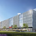 Modern Commercial Complex With Glass Facade Metal Stripe Design Landscaped Greenery Purple Flowers And Pedestrians