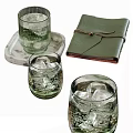 Transparent Glass Cups With Ice Cubes On Marble Tray And Green Leather Notebook