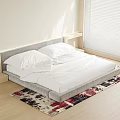 Modern Double Bed with Grey Headboard White Sheets and Colorful Rug on Wooden Floor