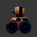 Orange Toy Robot With Large Textured Wheels And Blue Camera Lens