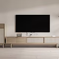 Minimalist Wooden TV Stand With Woven Panels And TV Near Decorative Statue Plant