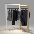 Clothing Store Clothing Rack With White And Wooden Frame Displaying Various Coats And Tops