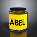Clear Glass Storage Jar with Yellow Label and Black Lid for Household Daily Use