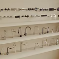 Bathroom and Kitchen Faucets Display on Shelves With Various Modern Styles and Finishes