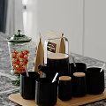 Glass Jar With Red Candies Paper Coffee Bag And Black Mugs With Wooden Lids