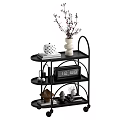 Black Multi Tier Storage Shelf Cart With Wheels And Decorative Items