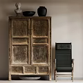 Vintage Wooden Decorative Cabinet with Sculpture Vase and Bowl on Top and Black Director Chair Beside