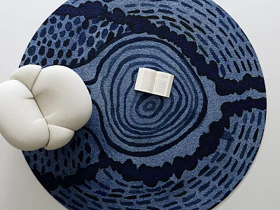 Deep Blue Round Rug With Concentric Circles Design Featuring Open Book And White Cushioned Seat 3d model