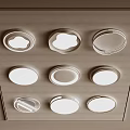 Various White Flush Mount Ceiling Lights With Different Designs On Wooden Background 3d model
