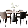 Round Marble Top Dining Table Set With Conical Base Brown Black Chairs And Flower Vase