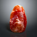 Natural Wood Stone With Red Pink Hue Irregular Shape And Glossy Texture Surface
