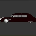 Vintage Luxury Burgundy Limousine With Streamlined Design Multiple Windows And Silver Wheels