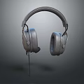 Gray Wired Over Ear Headphones With Soft Ear Cushions And Modern Comfortable Design