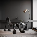 Black Unique Shaped Single Chair With Modern Design And Floor Lamp In Interior Decor