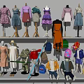Mannequins Display Various Styles of Clothing And Different Colored Backpacks On Shelves