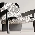 Modern Accent Chair Featuring Black and White Pattern and Dark Wooden Armrests and Legs
