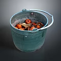 Fresh Orange Fruits In Green Bucket With Dried Leaves And Natural Produce