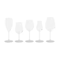 Various Wine Bottles And Drinking Glasses Including Cocktail Beer And Goblet Styles