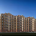 Modern Townhouse Exterior Featuring Multi Storey Balconies Brick Facade Green Lawn And Blue Sky