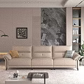 Modern Three Seater Leather Sofa In Interior With Marble Wall Decorative Painting And Green Plant