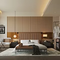 Hotel Guest Room With Upholstered Headboard Bed Wooden Wardrobes Sofa Warm Lighting And Cozy Rug