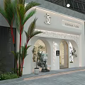 SPA MANA Shopping Mall Storefront With White Arched Doorways Green Plants And Stone Lion