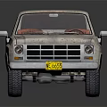 Old Rusty Pickup Truck With Faded Paint Open Bed Grille And Yellow License Plate