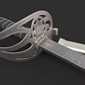 Ornate Historical Sword With Intricate Hilt Guard And Engraved Metallic Blade Design