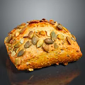 Artisan Whole Grain Bread Topped With Pumpkin Seeds And Almond Slices Golden Crust
