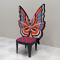 Colorful Butterfly Wing Shaped Single Chair With Patterned Seat And Black Legs
