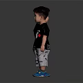 Cute Toddler Boy Wearing Black Bear Print T Shirt And Gray Shorts