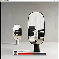 Large And Small Oval Mirrors With Black White Bases Gray Wall Reflecting Black Chairs Tables