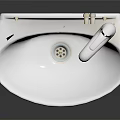 White Ceramic Wall Mounted Washbasin With Chrome Faucet And Modern Design