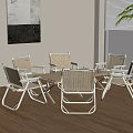 Modern Outdoor Table With Folding Rattan Chairs And Wooden Top Near Window Plant