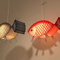 Red And Gold Fish Shaped Pendant Lights Hanging In Home Interior 3d model