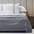 Modern Double Bed Bedroom Interior With Gray Duvet Pillows And Wooden Nightstand
