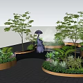 Modern Tree Planters With Green Plants And Water Fountain In Landscaped Pathway