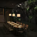 Natural Style Private Dining Room With Rock Background Lush Greenery And Wooden Table