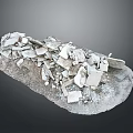 Collection of White Broken Stone Fragments on Tray with Dark Background