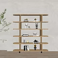 Wooden Shelving Unit With Multiple Tiers Displaying Decorative Figurines Books And Vase On Neutral Wall