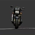 Black and Yellow Striped Motorcycle Parked on Gray Mat with Dark Background