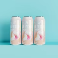 Three Cans of Oolong Peach Beverage with Light Pink Cans on Light Blue Background