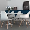 Modern White Round Dining Table With White Chairs Wooden Legs And Blue Cabinet Decorations