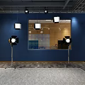 Public Workspace With Wooden Walls Large Blue Screen Lighting Stands And Wooden Flooring