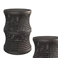 Two Dark Brown Woven Stools With Round Top And Intricate Weave Design