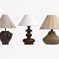 Three Unique Table Lamps With Carved Ceramic Wooden Bases And Pleated Linen Shades