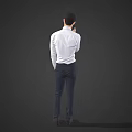 A Man Standing And Talking On Mobile Phone In White Shirt And Dark Pants