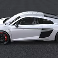 White Audi R8 Two Door Coupe With Black Wheels Red Brake Calipers And Sporty Spoiler